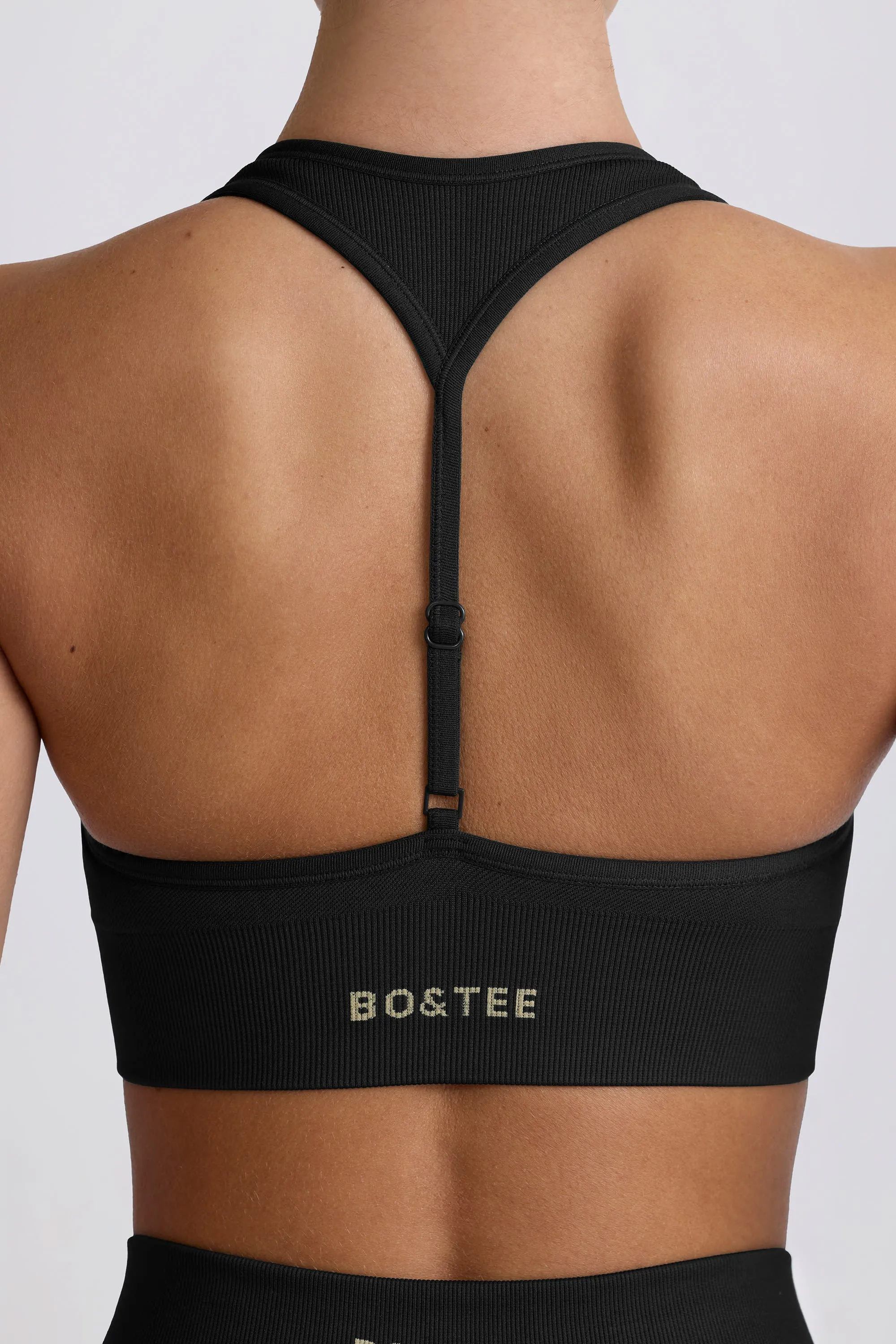 Super Sculpt Seamless T-Back Sports Bra in Black sold by Oh Polly product image thumbnail 5