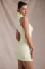 Ribbed-Knit Turtleneck Mini Dress in Butter Yellow sold by Oh Polly