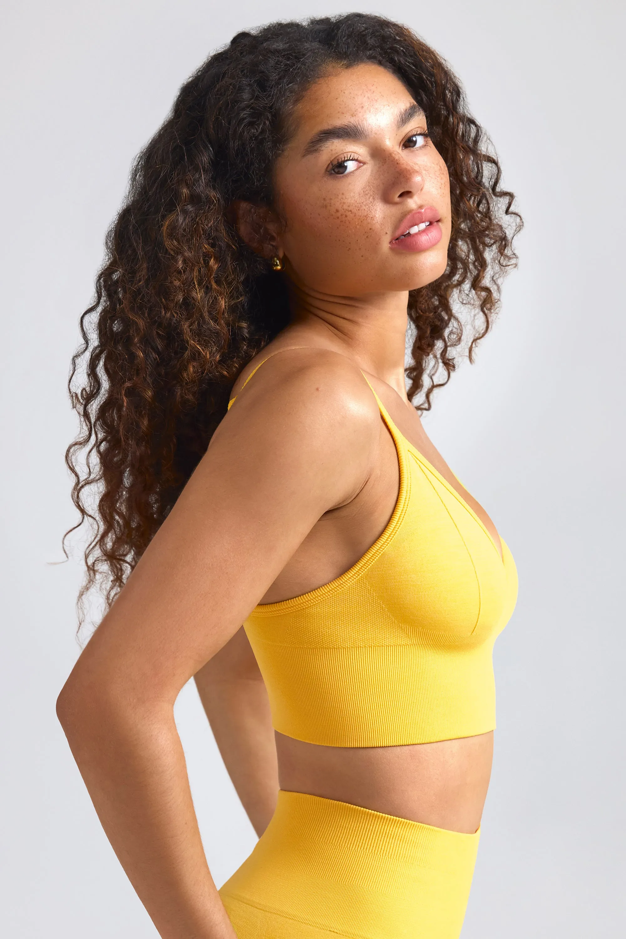 Define Luxe V-Neck Sports Bra in Golden Yellow sold by Oh Polly product image thumbnail 3