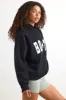 Appliqué Oversized Hoodie in Black sold by Oh Polly