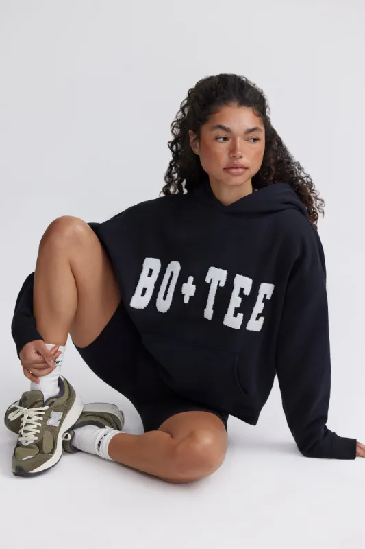Appliqué Oversized Hoodie in Black sold by Oh Polly