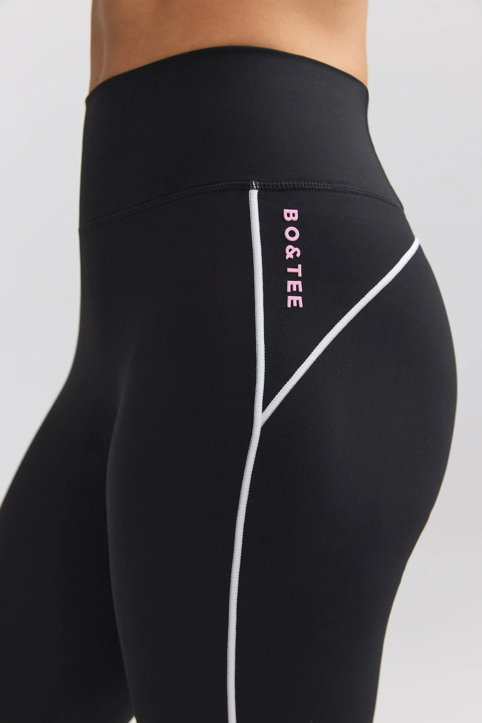 Soft Active Contrast-Trim Flared Trousers in Black sold by Oh Polly product image thumbnail 4