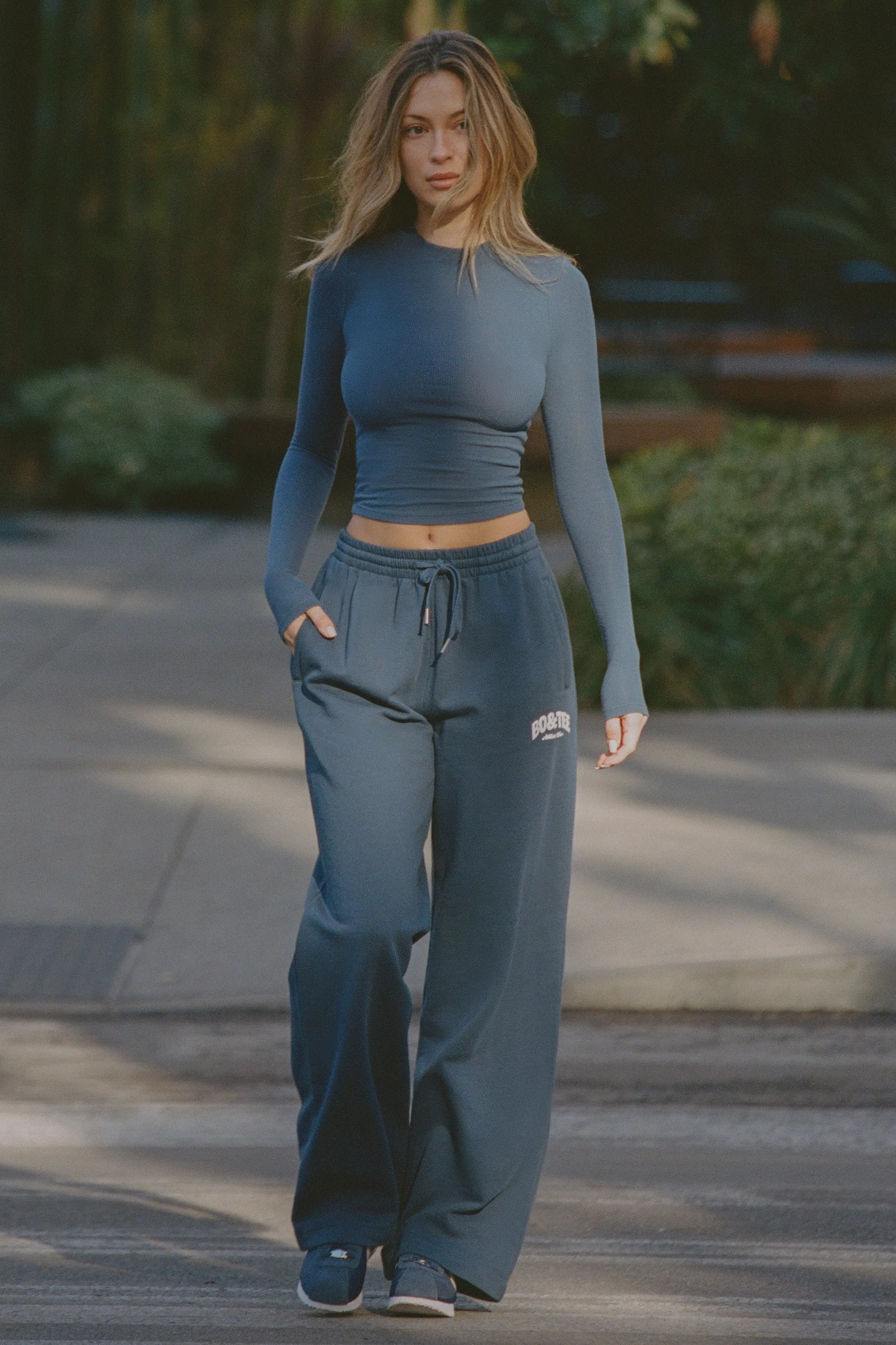 Mid-Rise Wide-Leg Joggers in Dark Navy sold by Oh Polly