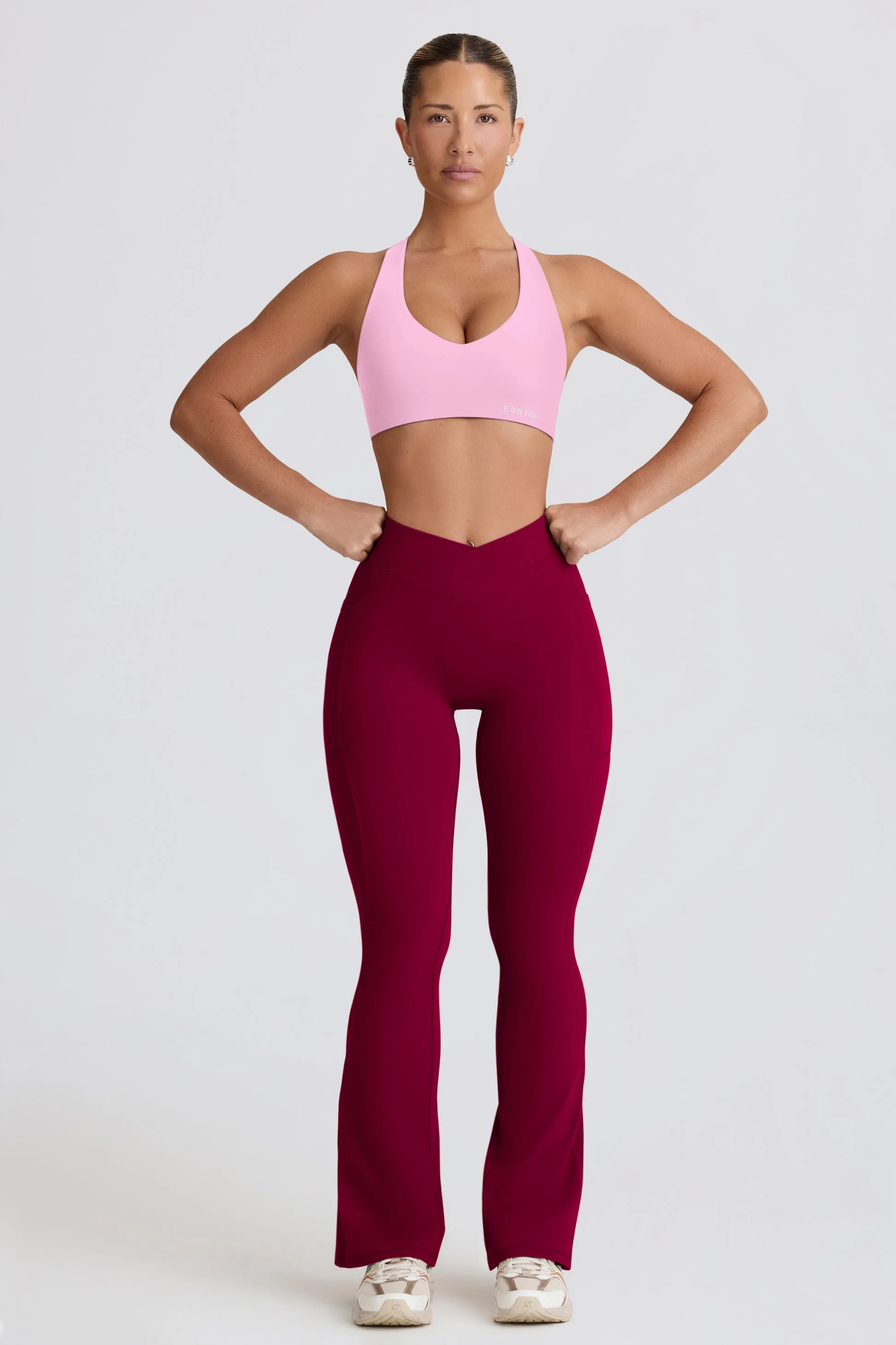 Soft Active Crossover Flared Trousers in Burgundy sold by Oh Polly product image thumbnail 3