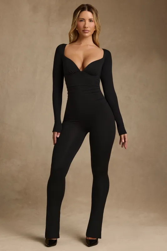 Modal Ruched Long-Sleeve Jumpsuit in Black sold by Oh Polly