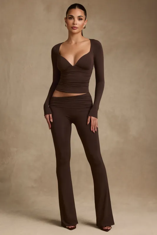Modal Asymmetric-Waist Flared Trousers in Chocolate Brown sold by Oh Polly