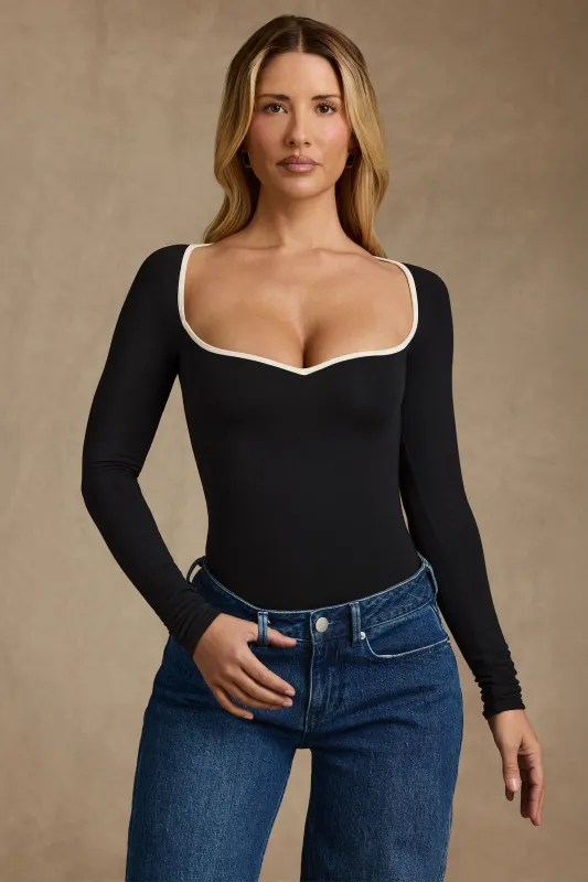 Modal Contrast-Trim Bodysuit in Black sold by Oh Polly