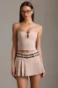 Belted Low-Rise Pleated Mini Skirt in Mushroom sold by Oh Polly