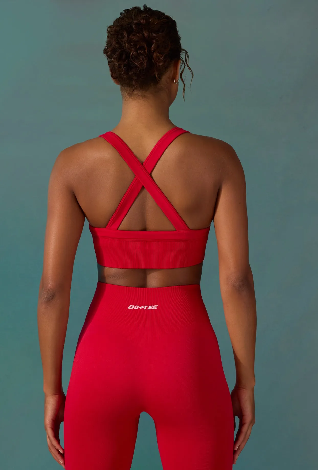 Super Sculpt Seamless Cross-Back Sports Bra in Tango Red sold by Oh Polly product image thumbnail 2