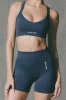 Super Sculpt Seamless Cross-Back Sports Bra in Blue sold by Oh Polly