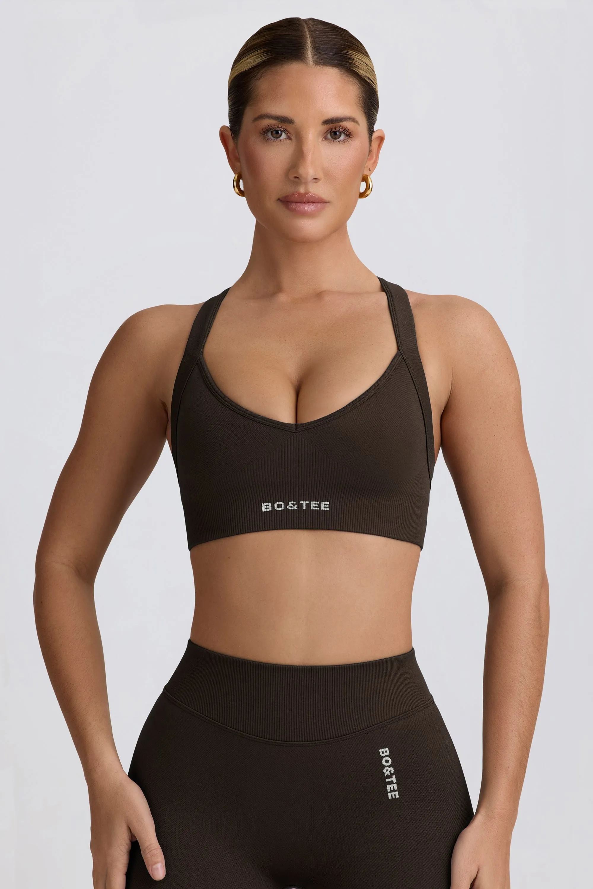 Super Sculpt Seamless Cross-Back Sports Bra in Brown sold by Oh Polly