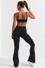 Petite Cross Waistband Flare Pocket Leggings in Black sold by Oh Polly