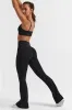 Petite Cross Waistband Flare Pocket Leggings in Black sold by Oh Polly