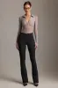 Low-Rise Flared Trousers in Black sold by Oh Polly