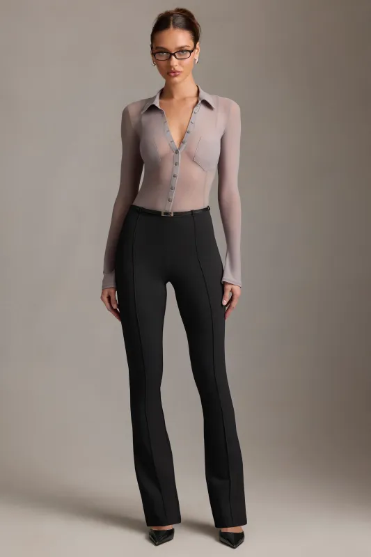 Low-Rise Flared Trousers in Black sold by Oh Polly