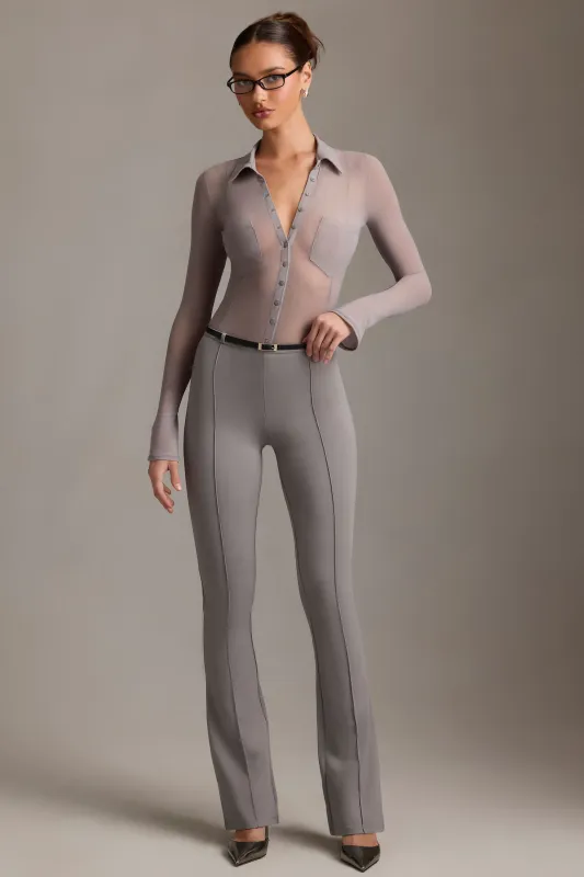 Low-Rise Flared Trousers in Grey sold by Oh Polly