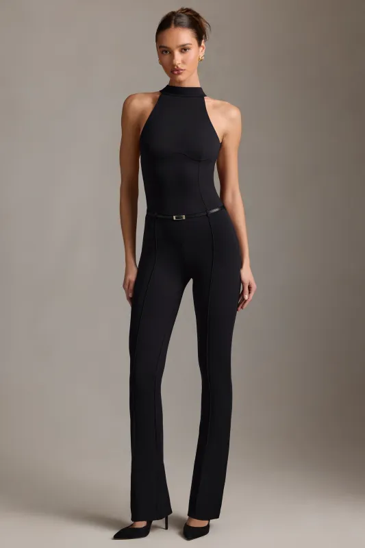 Backless Turtleneck Jumpsuit in Black sold by Oh Polly