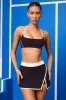 Soft Active Mini Skort in Black sold by Oh Polly