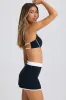 Soft Active Mini Skort in Black sold by Oh Polly
