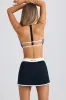 Soft Active Mini Skort in Black sold by Oh Polly