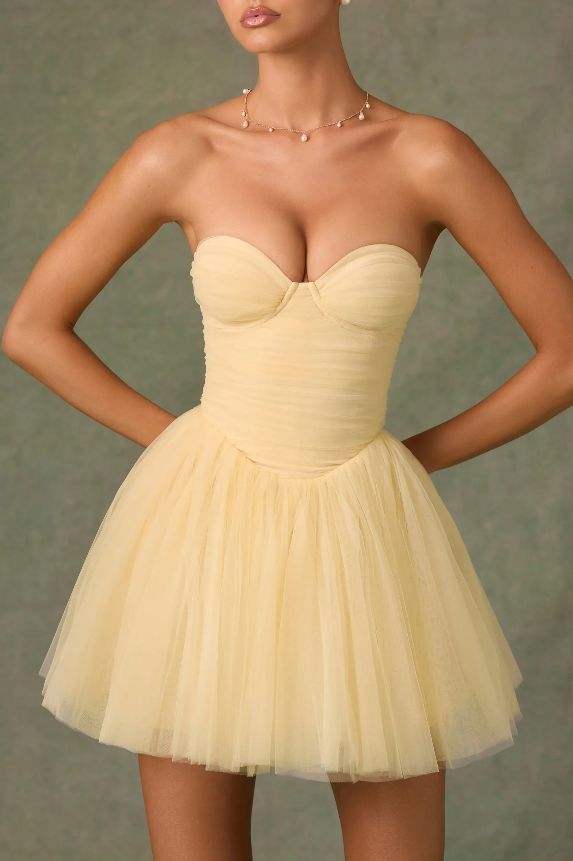 Tulle Corset Mini Dress in Yellow sold by Oh Polly product image thumbnail 2