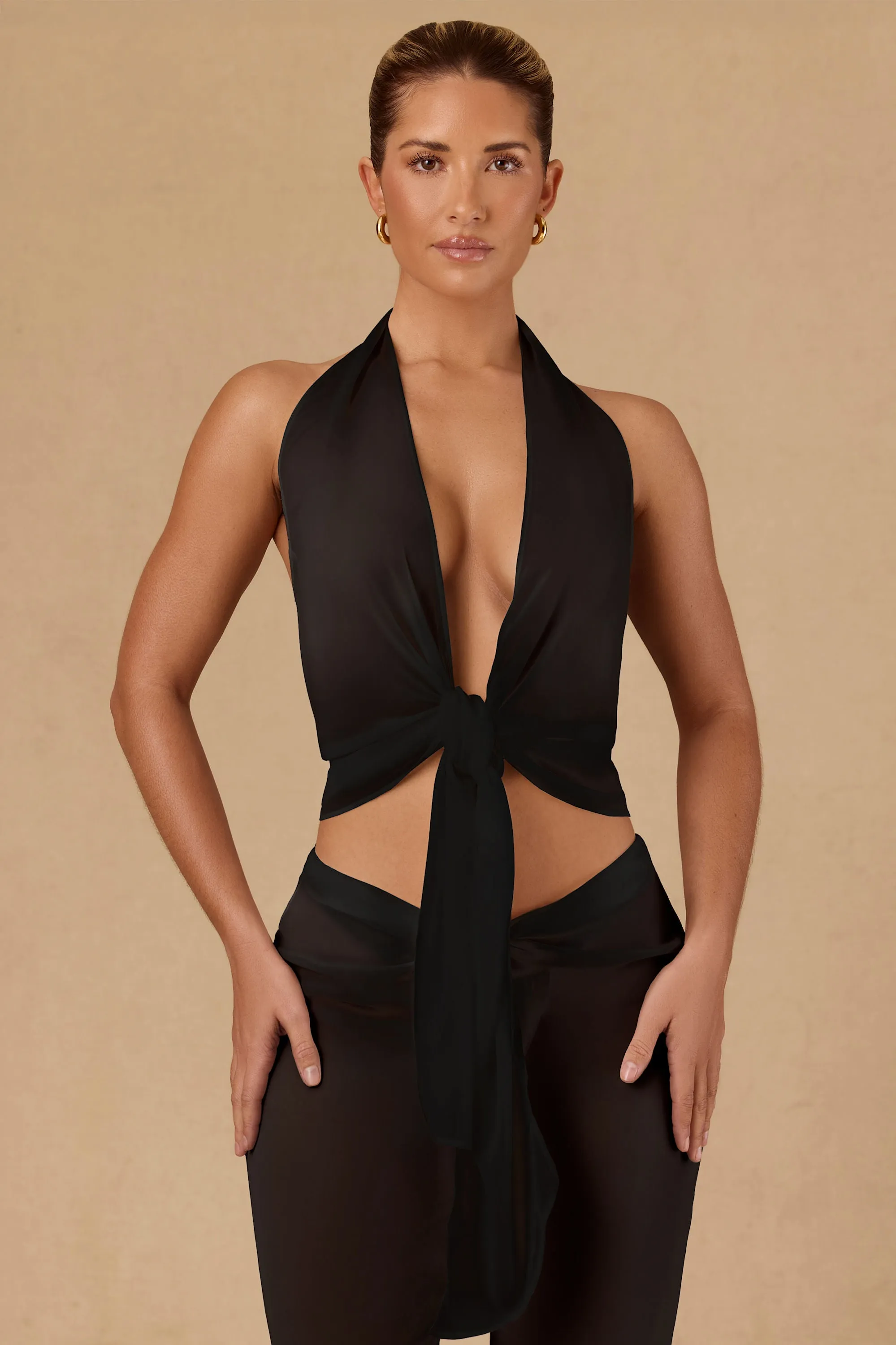 Tie-Front Halterneck Crop Top in Black sold by Oh Polly
