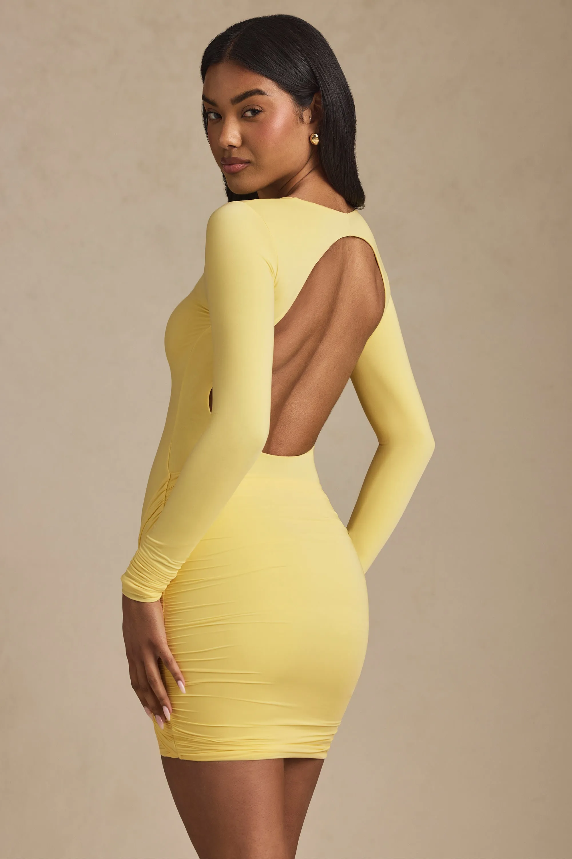 Twist-Front Ruched Backless Mini Dress in Pastel Yellow sold by Oh Polly product image thumbnail 5