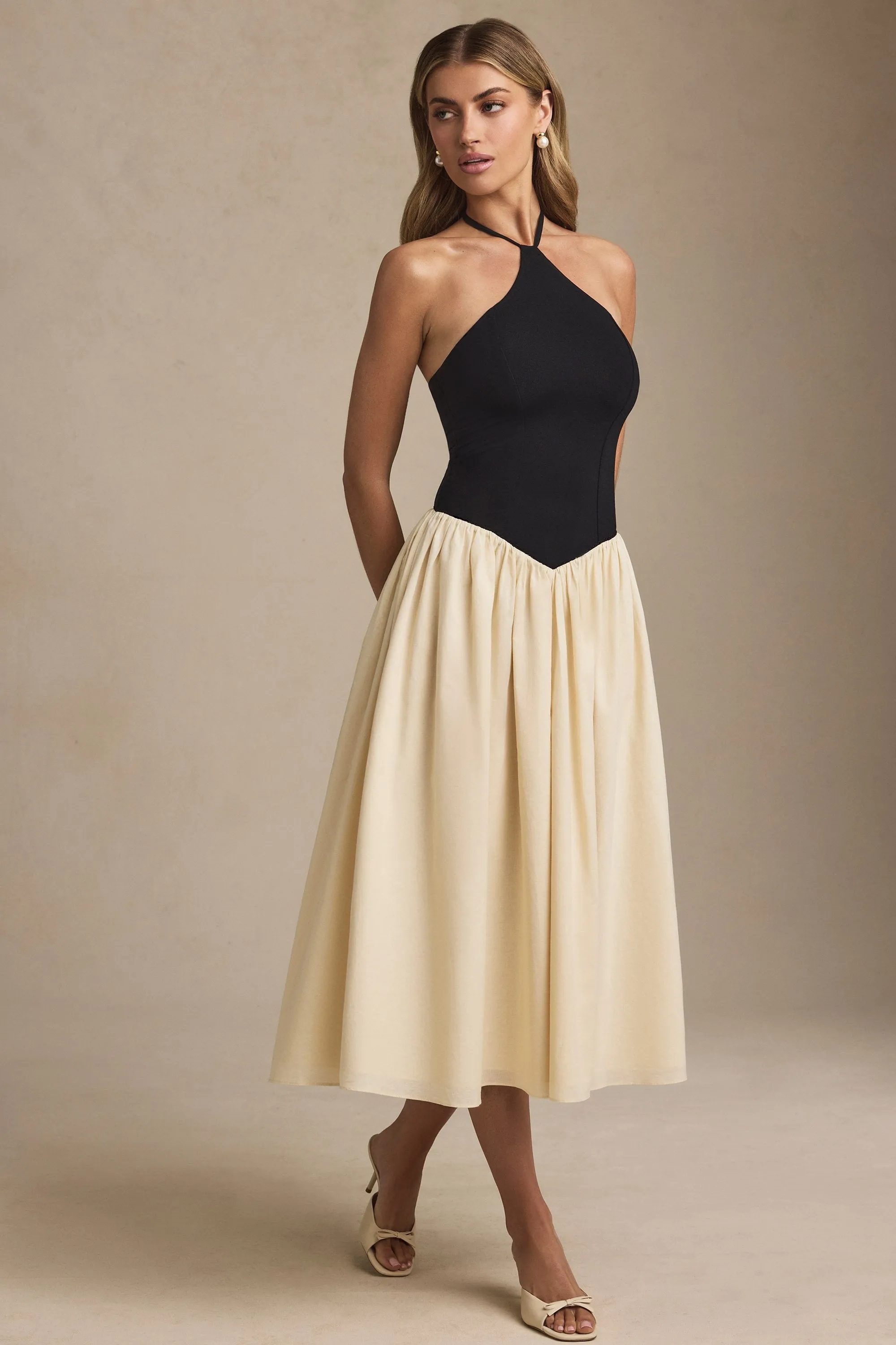 Halterneck A-Line Midaxi Dress in Black sold by Oh Polly