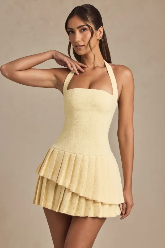 Asymmetric Layered Halterneck Mini Dress in Pastel Yellow sold by Oh Polly