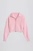 Ribbed-Knit Cropped Zip-Up Sweatshirt in Pale Pink sold by Oh Polly