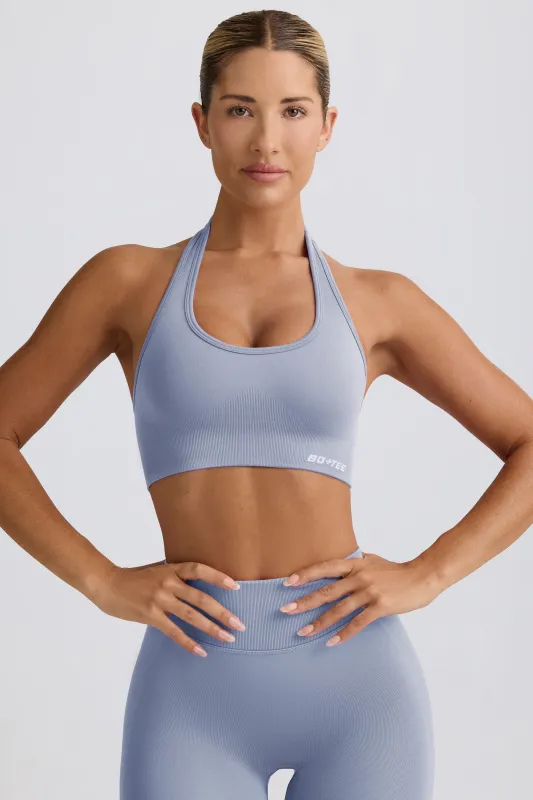 Define Luxe Halterneck Sports Bra in Blue Grey sold by Oh Polly