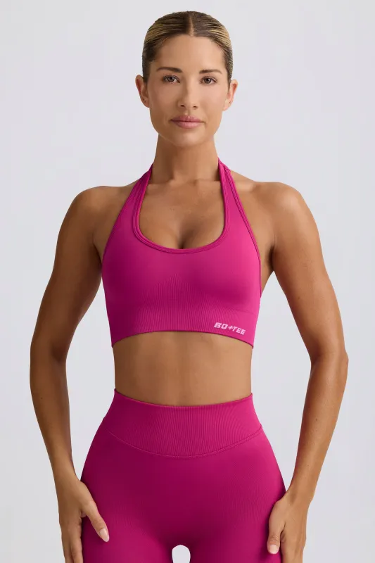 Define Luxe Halterneck Sports Bra in Berry sold by Oh Polly