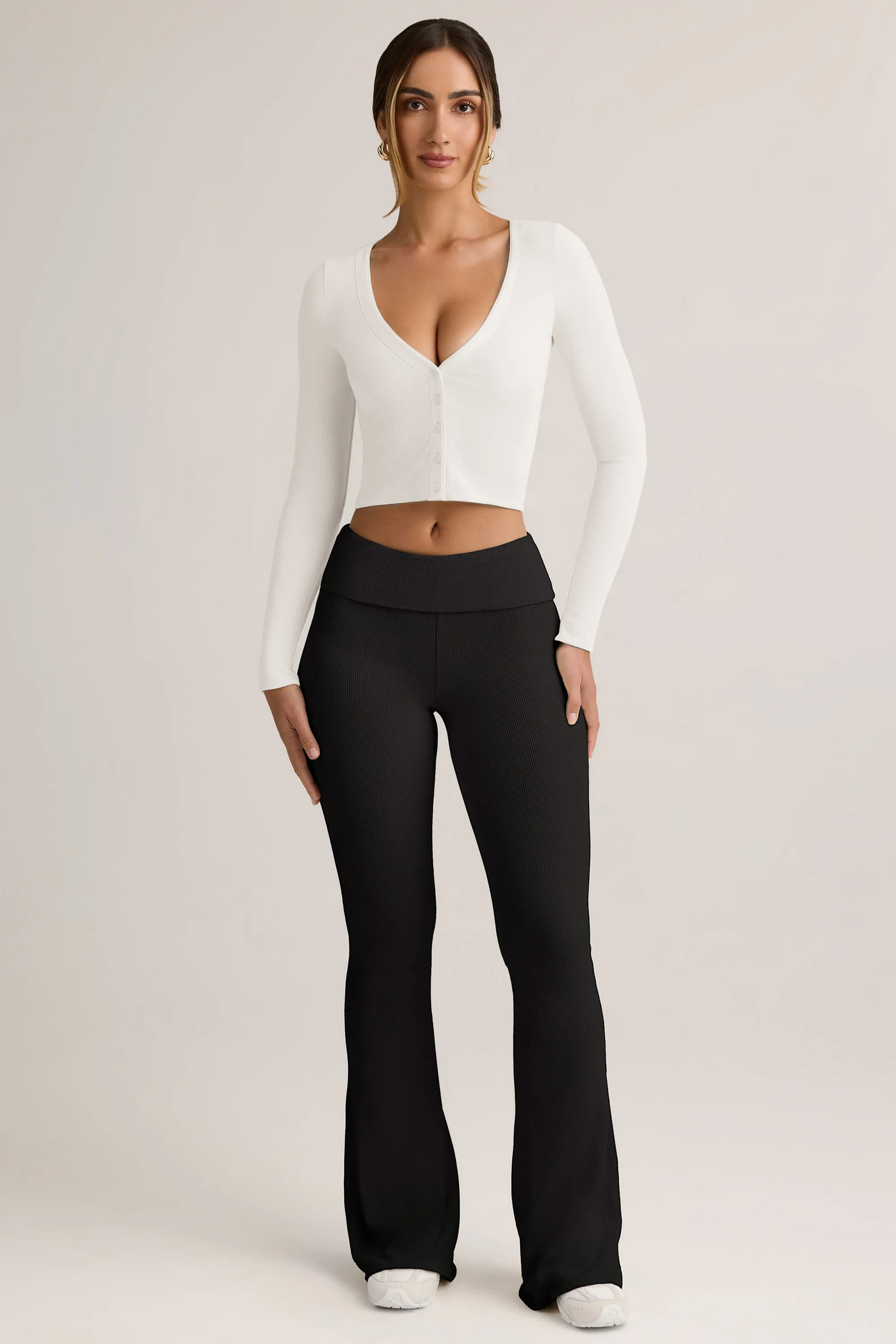 Modal Ribbed Foldover Flared Trousers in Black sold by Oh Polly