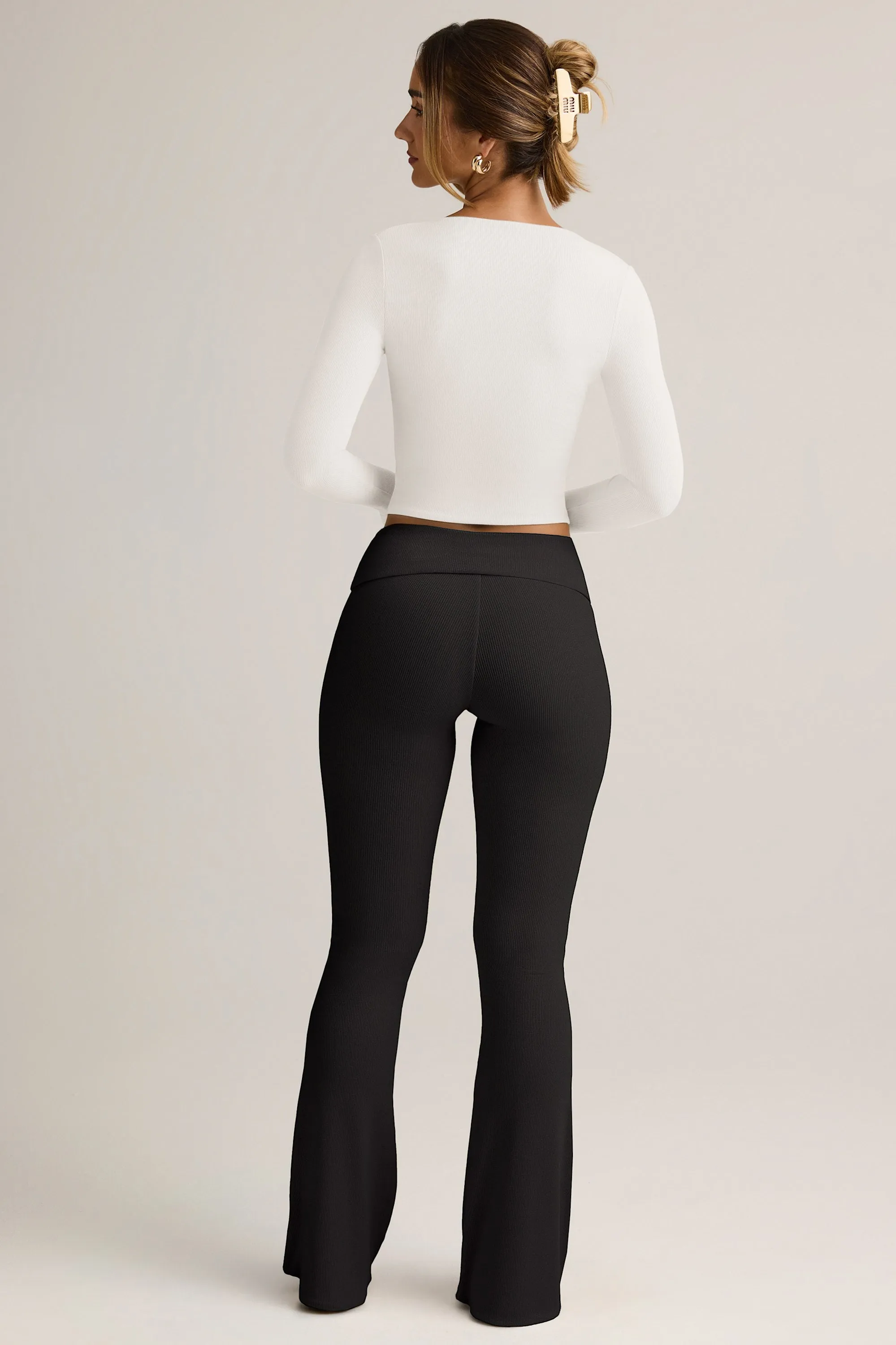 Modal Ribbed Foldover Flared Trousers in Black sold by Oh Polly product image thumbnail 2