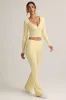 Modal Ribbed Foldover Flared Trousers in Buttercream Yellow sold by Oh Polly