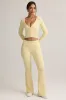 Modal Ribbed Foldover Flared Trousers in Buttercream Yellow sold by Oh Polly