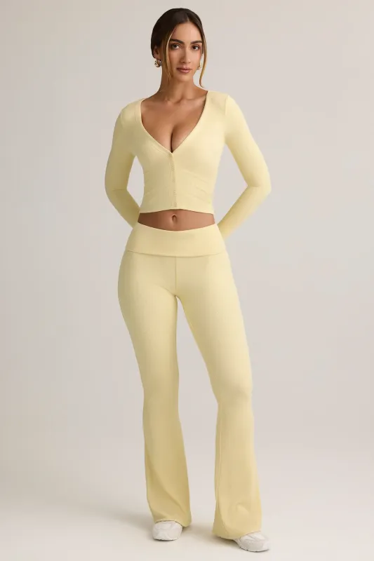 Modal Ribbed Foldover Flared Trousers in Buttercream Yellow sold by Oh Polly