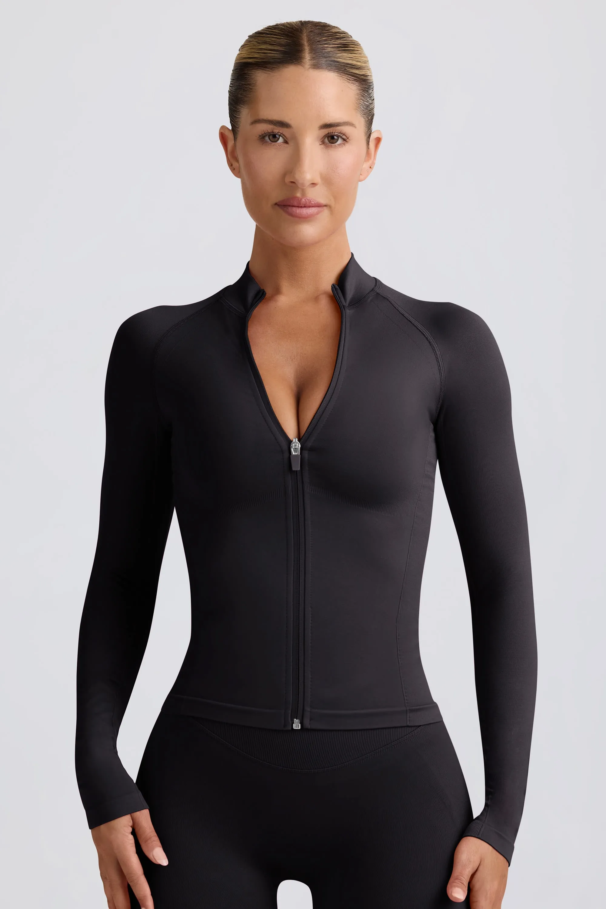 Define Luxe Zip-Up Jacket in Black sold by Oh Polly