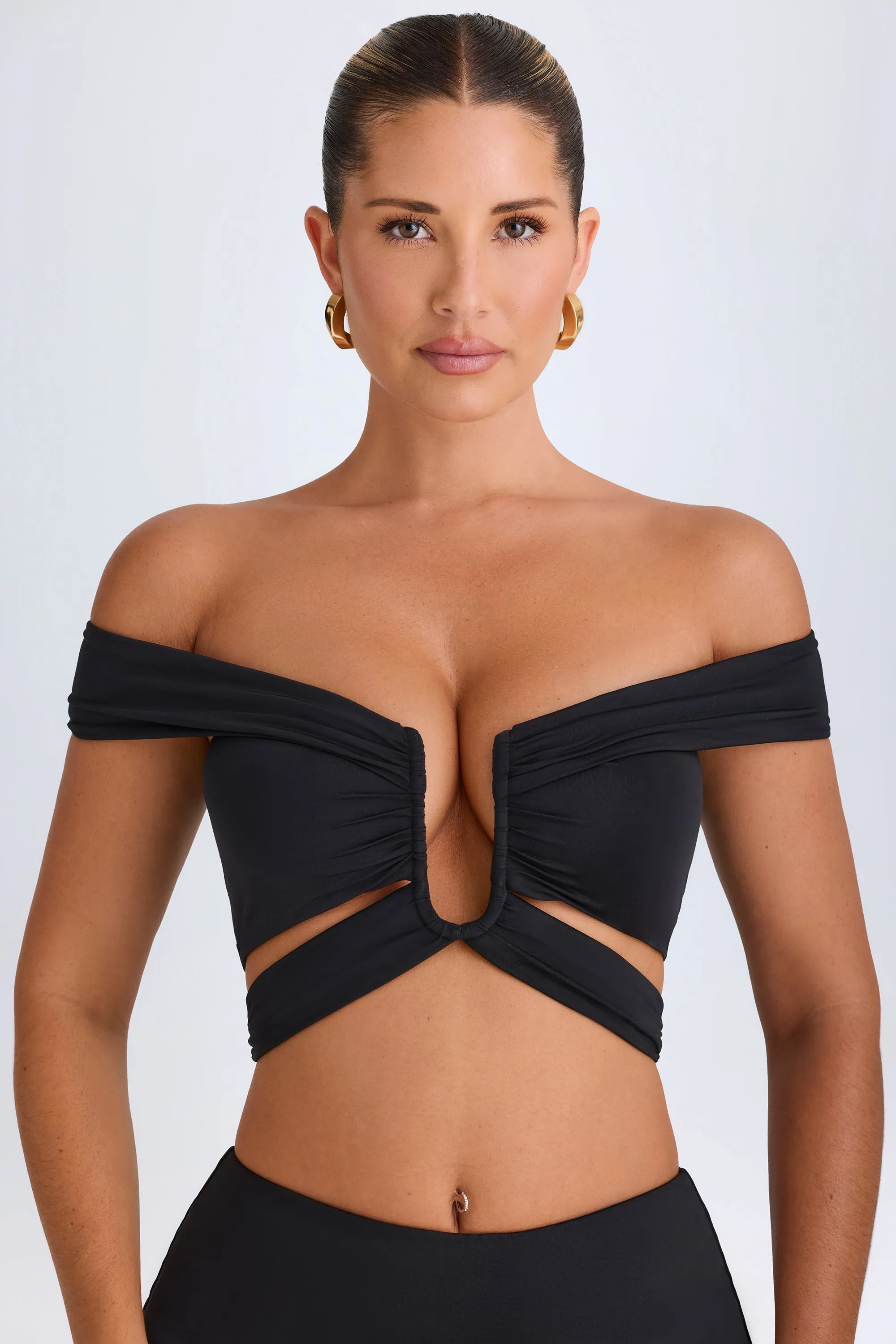 Cut-Out Off-Shoulder Crop Top in Black sold by Oh Polly