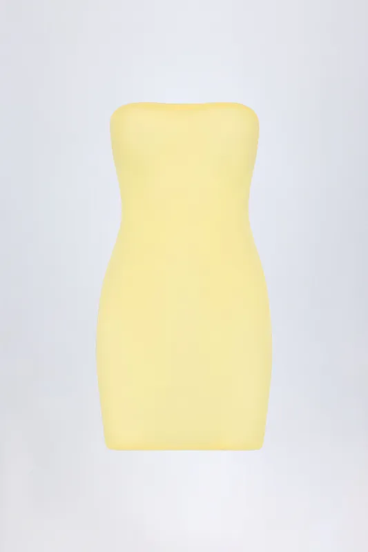Soft Mesh Mini Slip Dress in Yellow sold by Oh Polly