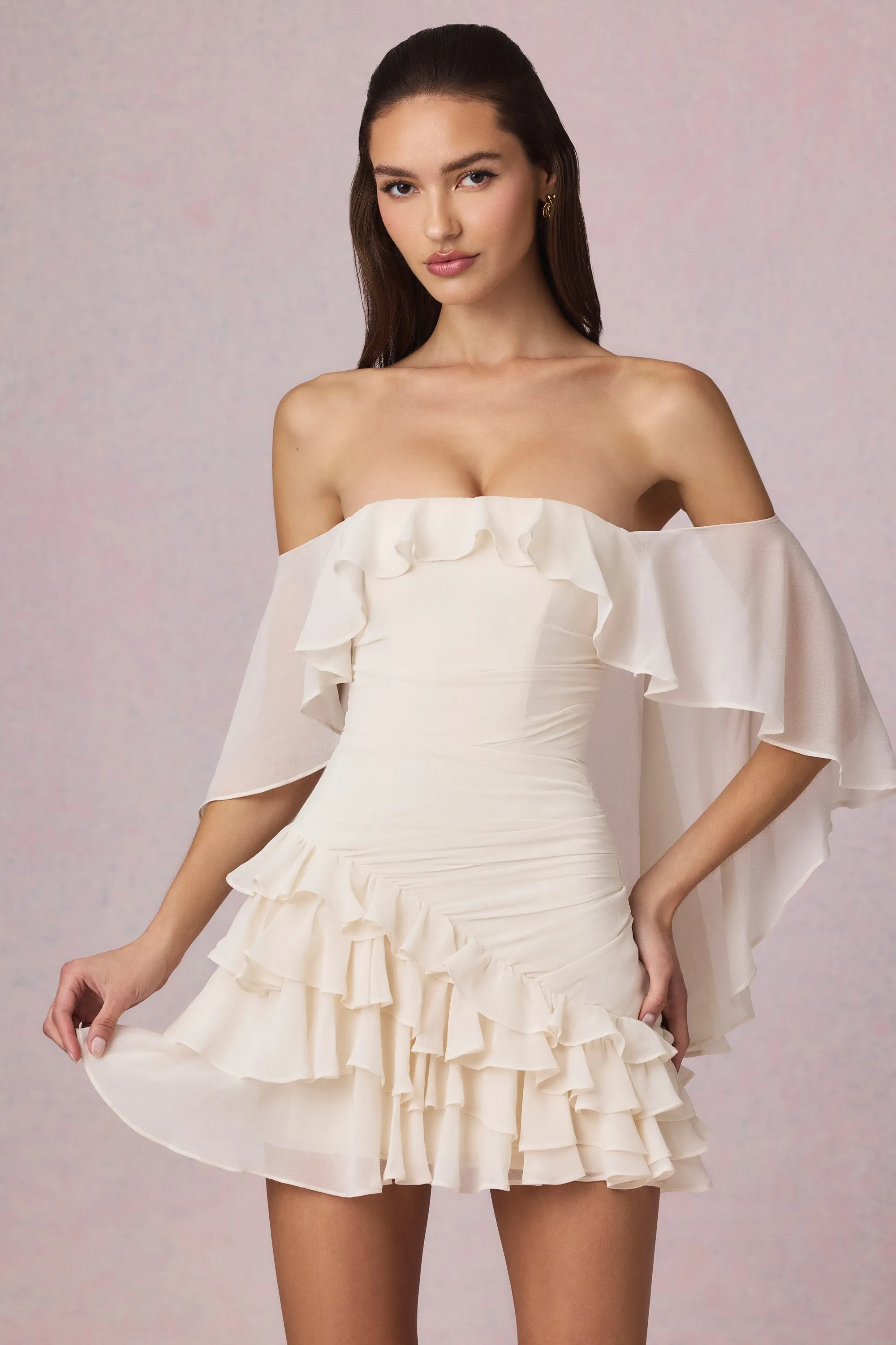 Off-Shoulder Ruffled Mini Dress in Ivory sold by Oh Polly