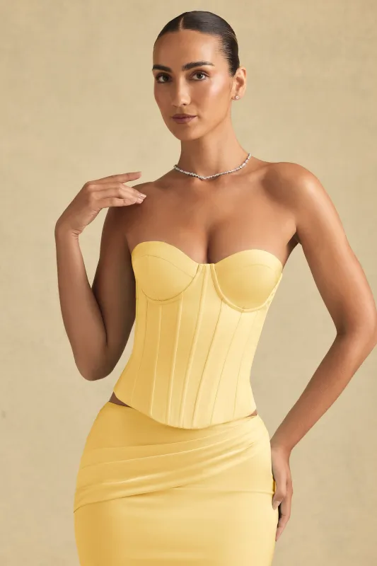 Lace-Up Corset Top in Pastel Yellow sold by Oh Polly