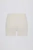 Soft Active Crossover Pocket Shorts in Cream sold by Oh Polly