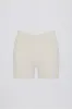 Soft Active Crossover Pocket Shorts in Cream sold by Oh Polly