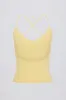 Cross-Back Tank Top in Lemon sold by Oh Polly