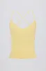 Cross-Back Tank Top in Lemon sold by Oh Polly