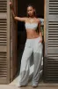 Button-Detail Low-Rise Wide-Leg Joggers in Light Grey sold by Oh Polly