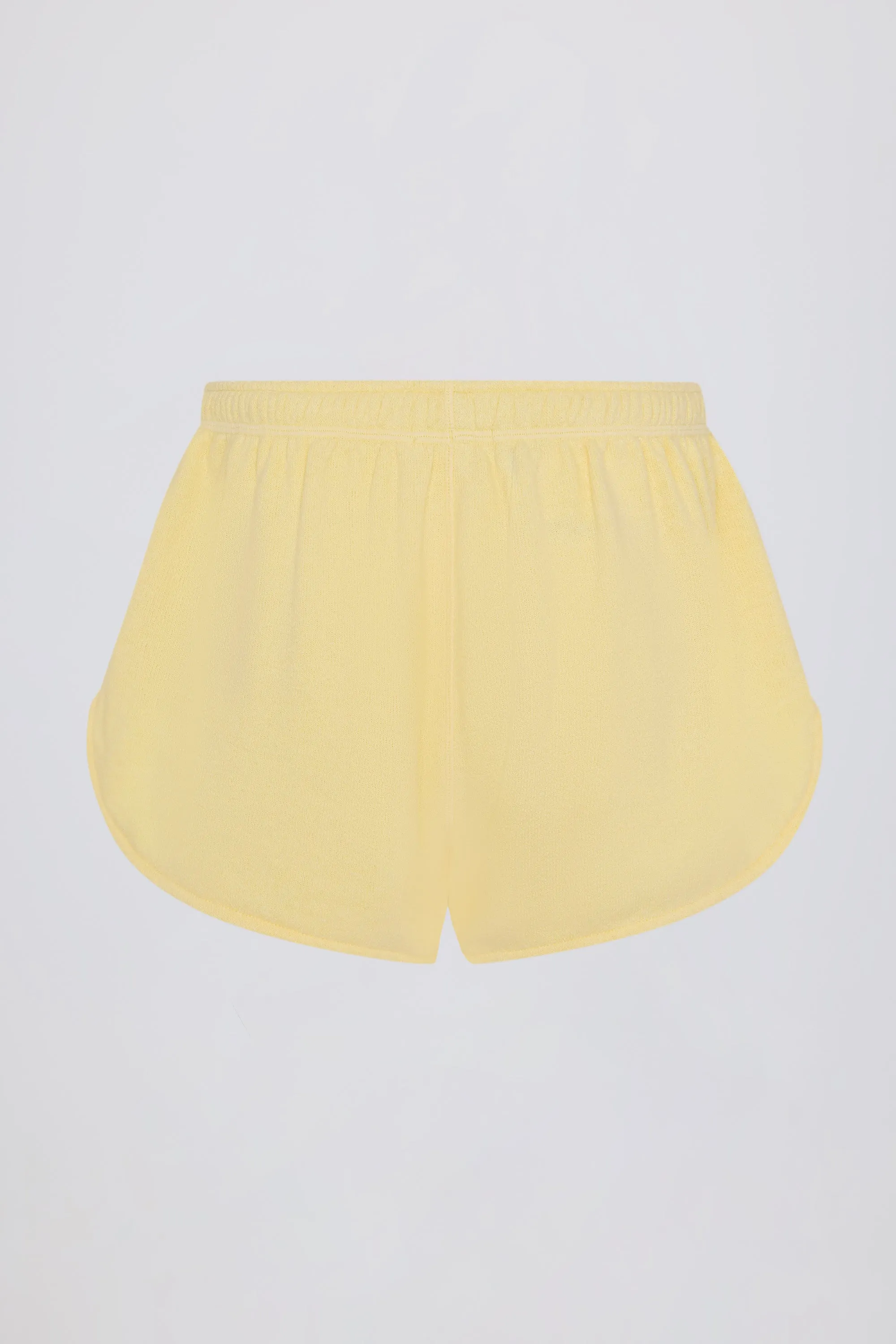 Button-Detail Mid-Rise Shorts in Lemon sold by Oh Polly product image thumbnail 5