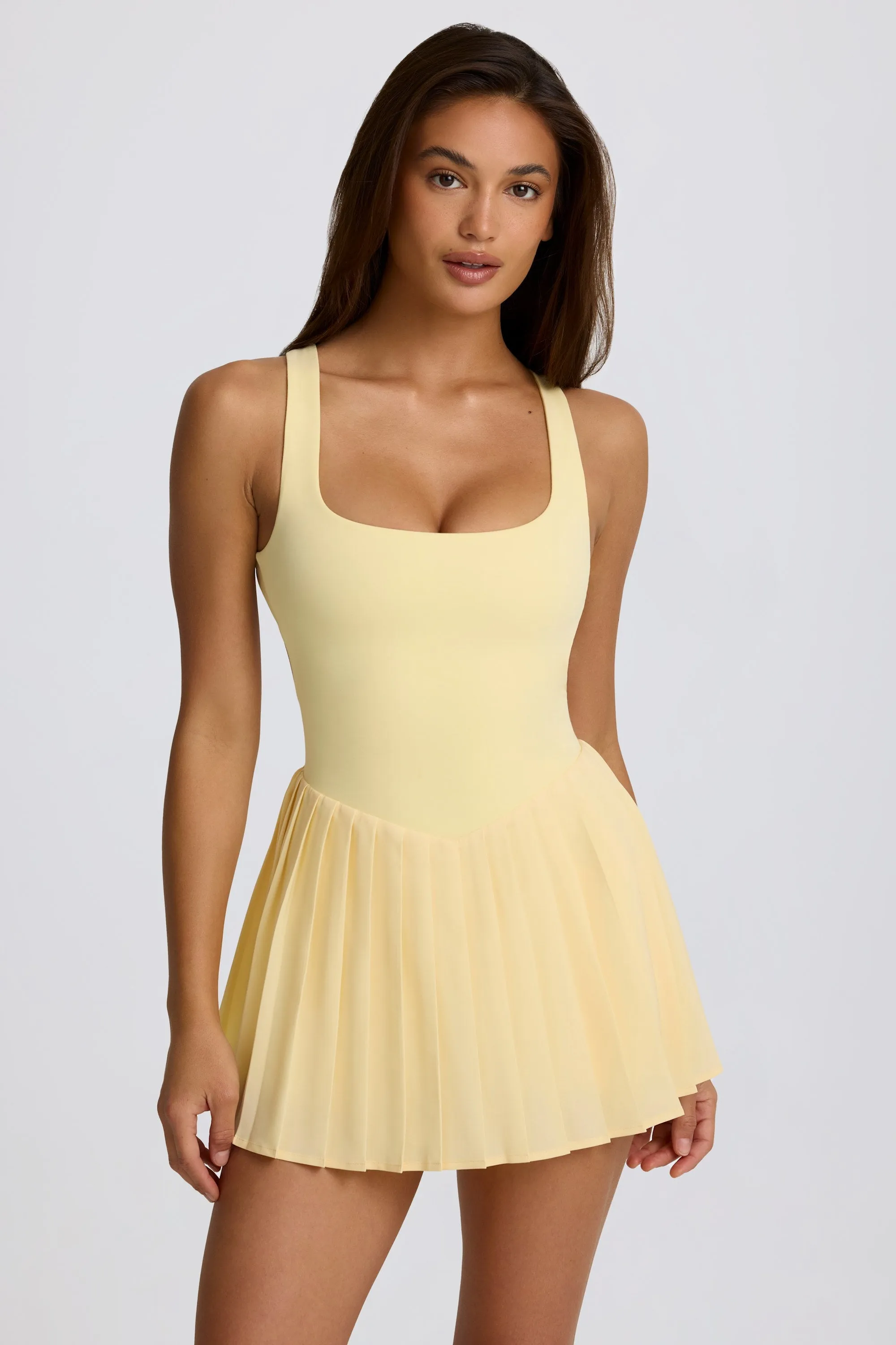 Soft Active Open-Back Pleated Tennis Dress in Lemon sold by Oh Polly product image thumbnail 5