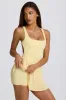 Soft Active Open-Back Pleated Tennis Dress in Lemon sold by Oh Polly